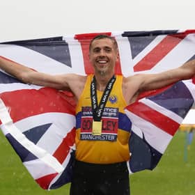 Neil Gourley celebrates winning the men's 1500m final during day two of the UK Athletics Championships at a rainy Manchester.