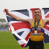 Neil Gourley celebrates winning the men's 1500m final during day two of the UK Athletics Championships at a rainy Manchester.
