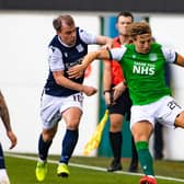 Sean Mackie fends off Paul McGowan during Hibs' last 16 Betfred Cup win over Dundee (Photo by Paul Devlin / SNS Group)(Photo by Paul Devlin / SNS Group)