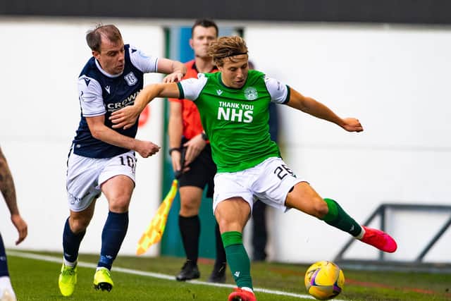 Sean Mackie fends off Paul McGowan during Hibs' last 16 Betfred Cup win over Dundee (Photo by Paul Devlin / SNS Group)(Photo by Paul Devlin / SNS Group)