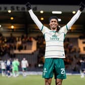 Jair Tavares celebrates in front of the Hibs fans after a big win in Dundee.