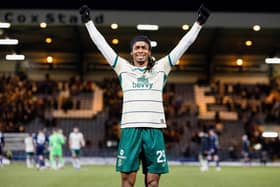 Jair Tavares celebrates in front of the Hibs fans after a big win in Dundee.