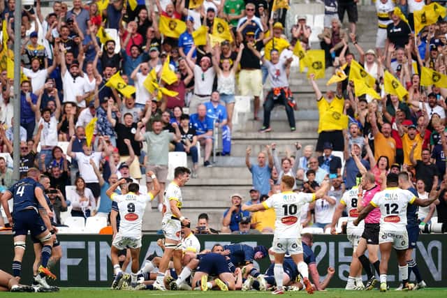 La Rochelle's Pierre Bourgarit (hidden) scores his side's second try of the game as they overcame Leinster in Marseille.
