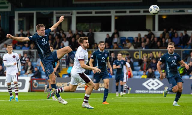 Hearts substitute Alan Forrest head home the winning goal against Ross County in Dingwall. (Photo by Mark Scates / SNS Group)