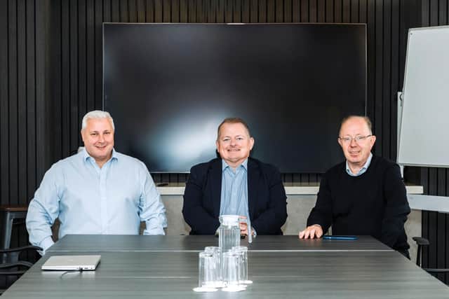 John Wiles, managing director; William Devine, head of Scotland; and Mike Randall, CEO.