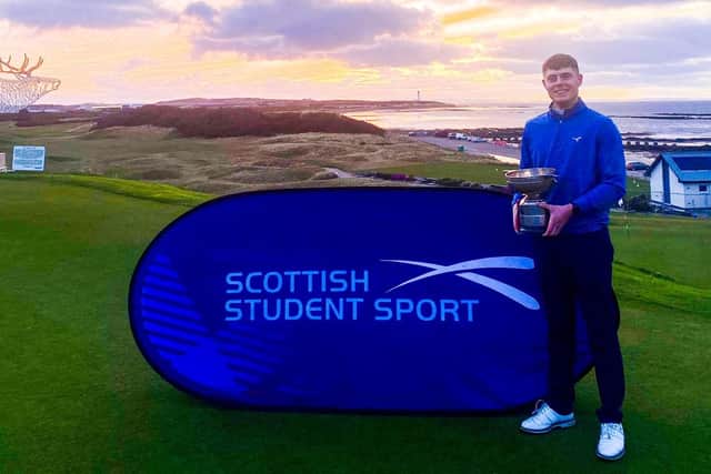 Taylor Kerr (University of Highlands and Islands) shows off his trophy after winning the Scottish Students Men's Championship in Lossiemouth. Picture: BUCS Golf