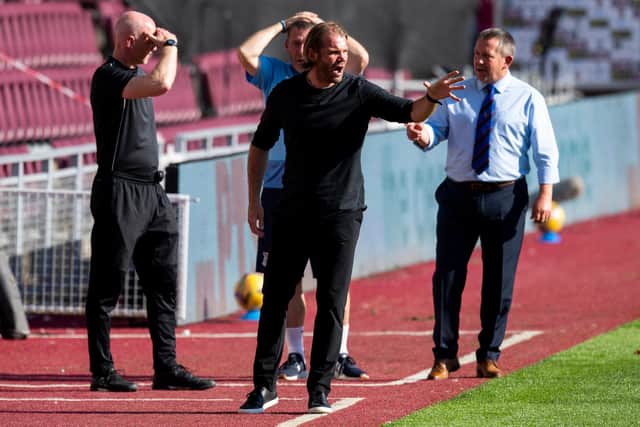 Hearts manager Robbie Neilson watched his team beat Inverness 1-0.