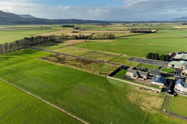 Aerial view of property and paddock.