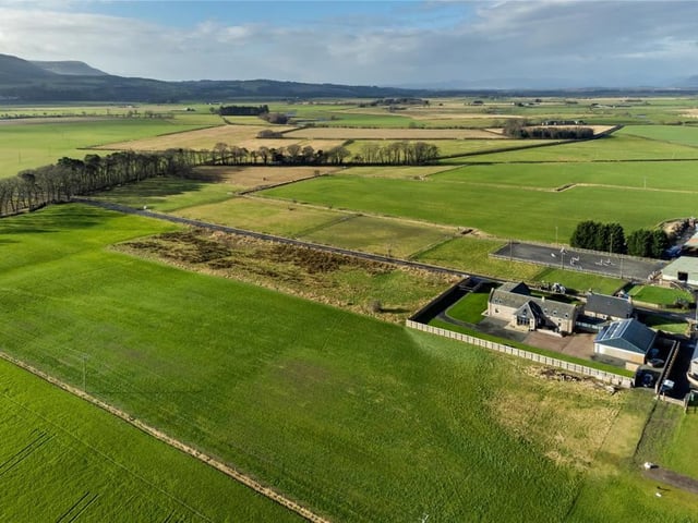 Aerial view of property and paddock.