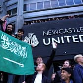 Newcastle United fans celebrate at St James' Park following the announcement that The Saudi-led takeover of Newcastle has been approved.