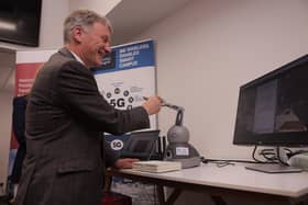 Minister for business, trade, tourism and enterprise Ivan McKee participating in 5G-enabled teleoperation demonstration.