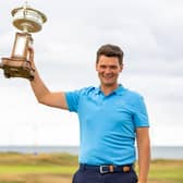 Angus Carrick celebrates his Scottish Men’s Amateur Championship triumph at Murcar Links in Aberdeen. Picture: Scottish Golf