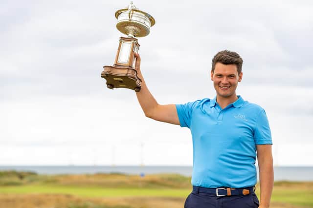 Angus Carrick celebrates his Scottish Men’s Amateur Championship triumph at Murcar Links in Aberdeen. Picture: Scottish Golf