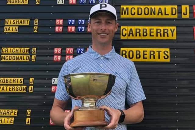 James White shows off the East of Scotland Open trophy after landing a five-shot success at home club Lundin at the end of June. Picture: Lundin Golf Club.