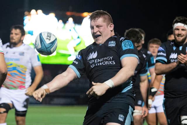 Glasgow Warriors' Johnny Matthews celebrates his third try in the win over Zebre at Scotstoun. (Photo by Ross MacDonald / SNS Group)