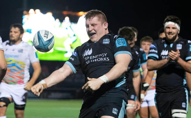 Glasgow Warriors' Johnny Matthews celebrates his third try in the win over Zebre at Scotstoun. (Photo by Ross MacDonald / SNS Group)