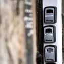 AirBnB locks outside a block of flats in Edinburgh in 2019.