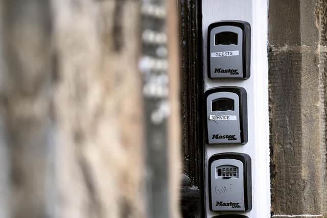 AirBnB locks outside a block of flats in Edinburgh in 2019.