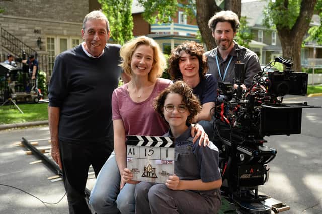 Afterlife producer Ivan Reitman, Carrie Coon, Mckenna Grace, Finn Wolfhard, and Director Jason Reitman on set. Picture : PA Photo/2021 CTMG, Inc