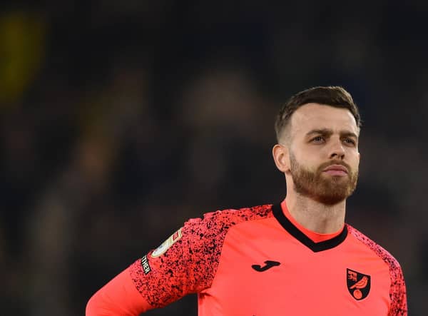 Angus Gunn of Norwich City is set to be called in the Scotland squad.