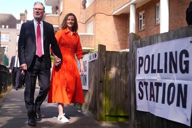 Labour leader Sir Keir Starmer and his wife Victoria arriving to cast their votes in the general election at Willingham Close TRA Hall in London on Thursday. Picture: James Manning/PA Wire