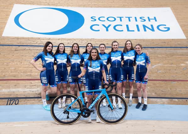 The 2024 Alba RT squad from left: Vicky Smith, Millie Skinner, Keira Bond, Beth Morrow, Eilidh Shaw, Daisy Barnes, Amelia Tyler, and Abi Plowman, with Arianne Holland holding the bike. (Bob Lyons)