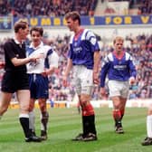 Referee Kenny Clark confronts Rangers striker Duncan Ferguson following a headbutt on Raith Rovers' Jock McStay.  The notorious incident took place 27 years ago this week