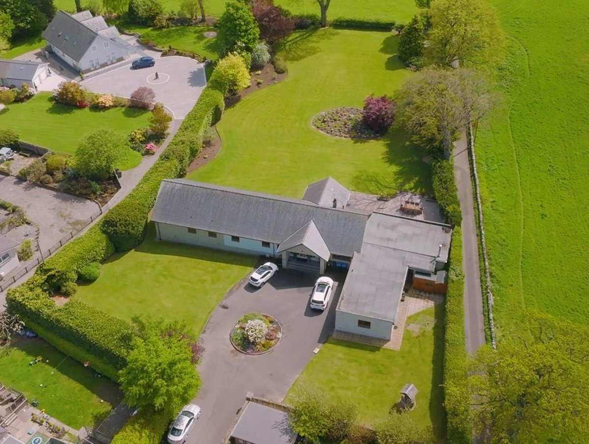 This exceptional 5-bedroom detached bungalow has luxury interiors and magnificent large gardens with countryside views