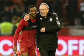 Aberdeen manager Neil Warnock and Luis 'Duk' Lopes share a laugh at full time after the 3-3 draw with Motherwell. (Photo by Craig Foy / SNS Group)