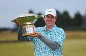 Bob MacIntyre shows off the trophy after his memorable win in the Genesis Scottish Open at The Renaissance Club. Picture: Andrew Redington/Getty Images.