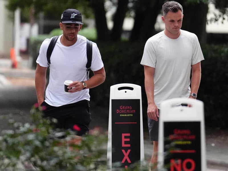 Scotland's Lawrence Shankland and Che Adams leaving the team hotel