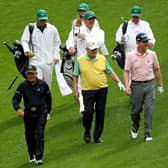 Tom Watson, right, is pictured playing in the Par 3 Contest prior to the start of the 2018 Masters and the two-time winner at Augusta National is now joining that duo as an Honorary Starter for the season's opening major in April. Picture: Patrick Smith/Getty Images.