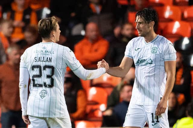 Hibs midfielder Scott Allan celebrates his goal with team-mate and fellow goalscorer Joe Newell during the Premier Sports Cup quarter-final victory at Tannadice. Photo by Paul Devlin / SNS Group