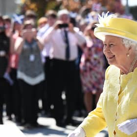 Schools in Scotland are expected to be closed during a public holiday on the day of the Queen's funeral. Pictured is the Queen on a visit to Greenfaulds High School in Cumbernauld (Photo: John Devlin).