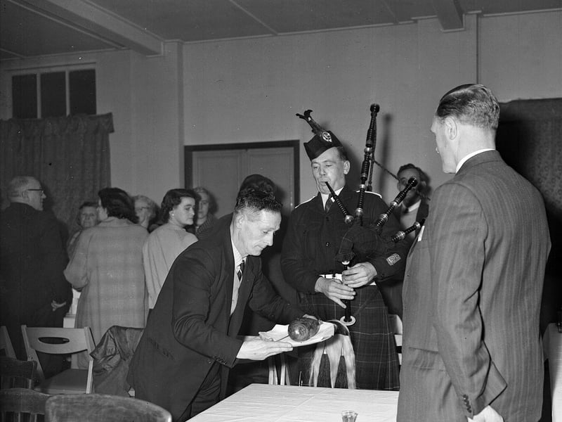 Jas Cairney pipes in the haggis at the Hearts Supporters Club, Tranent, Burns Supper in 1964.