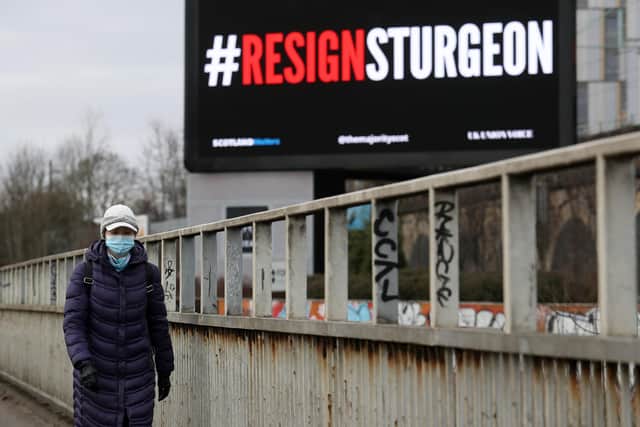 A digital billboard near the Clydeside Expressway in Glasgow showing the words #ResignSturgeon. Picture: Andrew Milligan/PA Wire