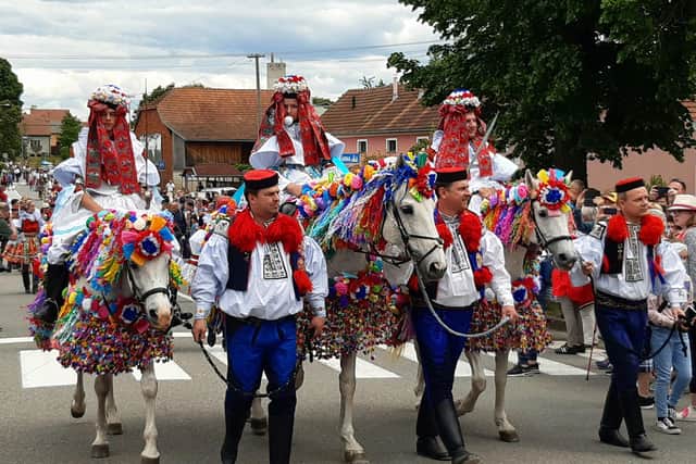 The boy king and his supporters are led through the village of Vlenov during the annual Ride of the Kings folk festival. Pic: PA Photo/Chris Wiltshire.