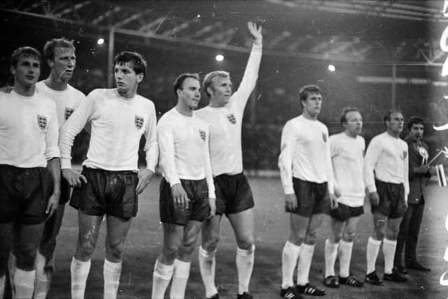 26th July 1966:  Members of the England football team, (from left) Roger Hunt, Jack Charlton, Martin Peters, Ray Wilson, Bobby Moore, Geoff Hurst, Nobby Stiles and George Cohen during the semi-final against Portugal.  (Photo by Ronald Dumont/Express/Getty Images)