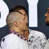 Ukraine's Oleksandr Usyk and Britain's Anthony Joshua face each other during a public weighing ahead of the heavyweight boxing rematch for the WBA, WBO, IBO and IBF titles between them, in the Saudi Red Sea city of Jeddah.