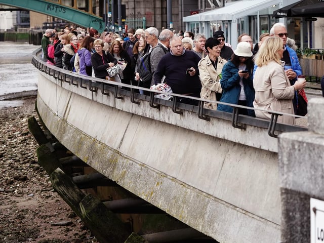Members of the public in the queue on the South Bank, central London, as they wait to view Queen Elizabeth II lying in state ahead of her funeral on Monday. Picture date: Thursday September 15, 2022.