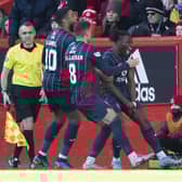 Ross County's Joseph Hungbo celebrates firing County into the top six.