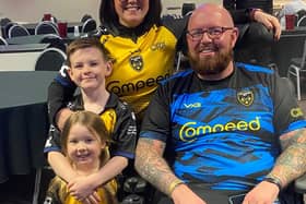 Mark Williams with his wife Stephanie and their two children. Photo: My Name'5 Doddie Foundation/PA Wire