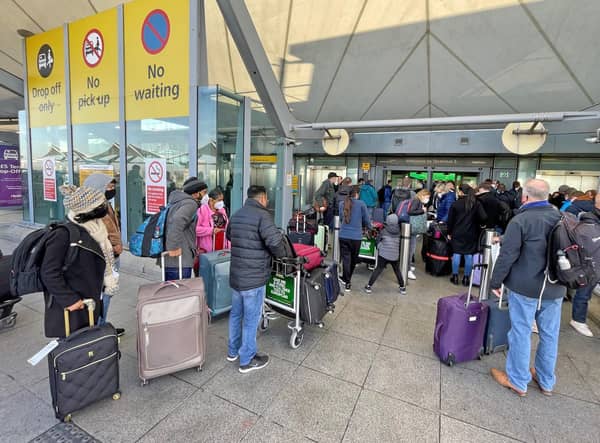 Passengers queuing at Heathrow's Terminal 5 on Saturday. Picture: Jonathan Brady/PA Wire