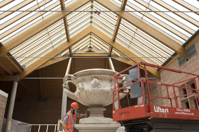 A Warwick Vase being cleaned at the new-look Burrell Collection.