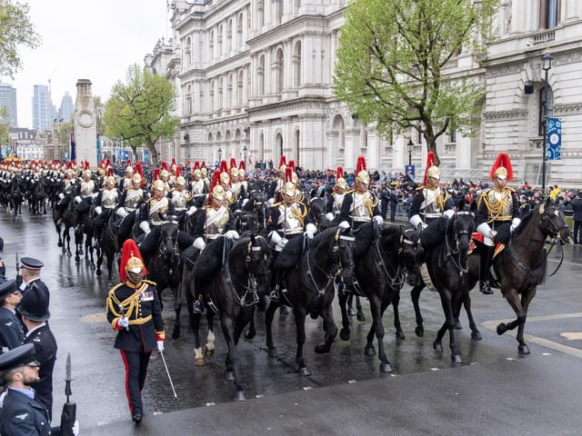 The Coronation Procession travels along Whitehall following the coronation of King Charles III and Queen Camilla in London.
