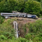 Emergency services inspecting the scene near Stonehaven, Aberdeenshire, following the derailment of the ScotRail train, which cost the lives of three people. Picture: Ben Birchall/PA Wire