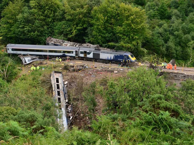 Emergency services inspecting the scene near Stonehaven, Aberdeenshire, following the derailment of the ScotRail train, which cost the lives of three people. Picture: Ben Birchall/PA Wire