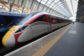 An Azuma rail LNER train at Kings Cross Station