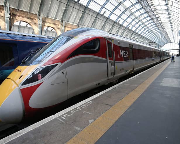 An Azuma rail LNER train at Kings Cross Station