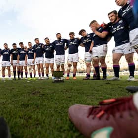 Scotland players celebrate with the trophy after defeating Argentina at the end of their international rugby union match at Padre Ernesto Martearena Stadium in Salta, Argentina on July 9, 2022.